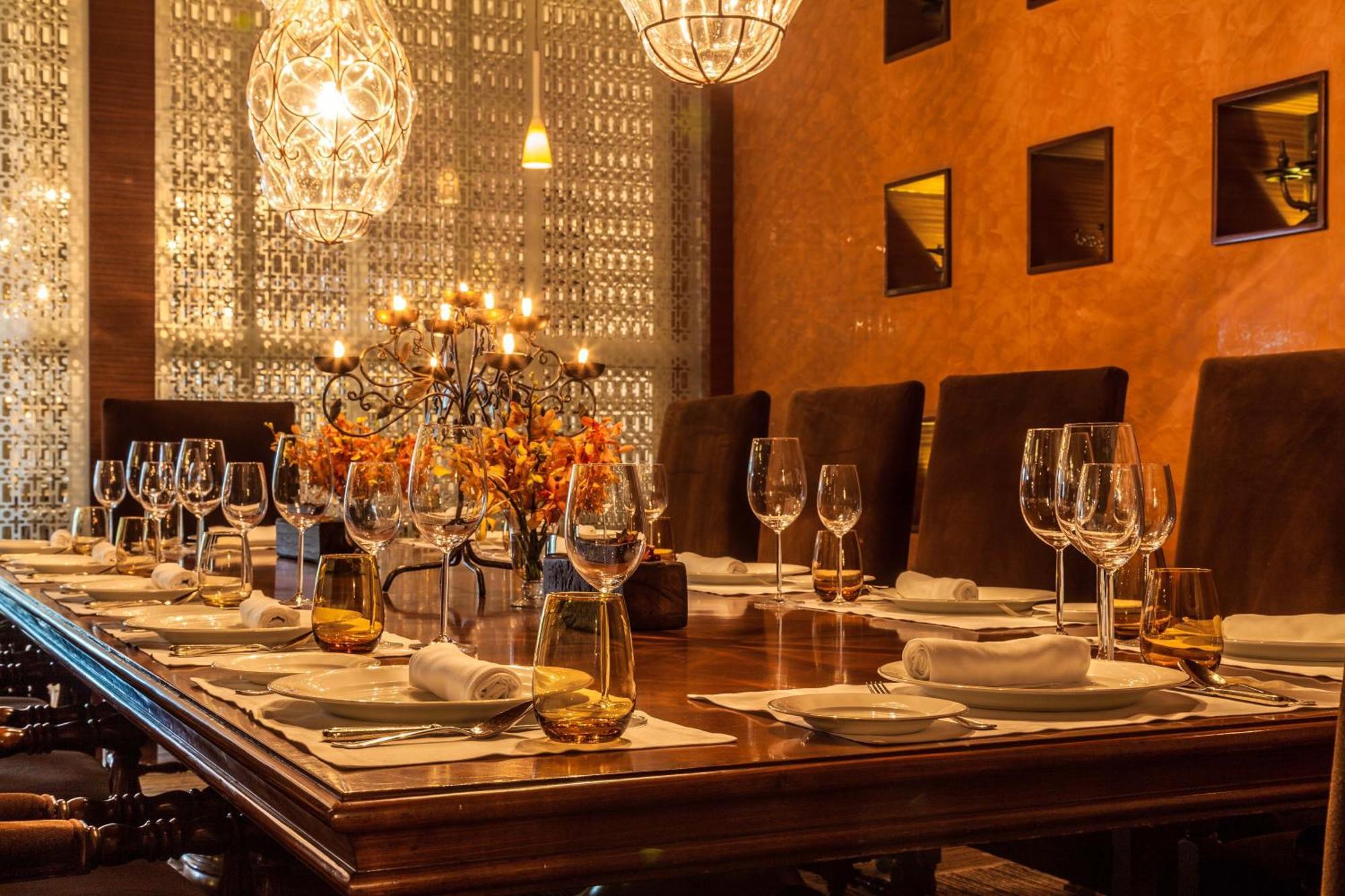 The Leela Ambience Gurugram Hotel & Residences - The Luxury Urban Sanctuary Гургаон Екстериор снимка A dining room table set for a meal